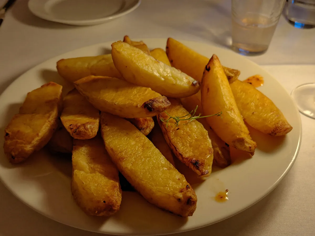 Картофельные дольки с сыром и лимоном в духовке