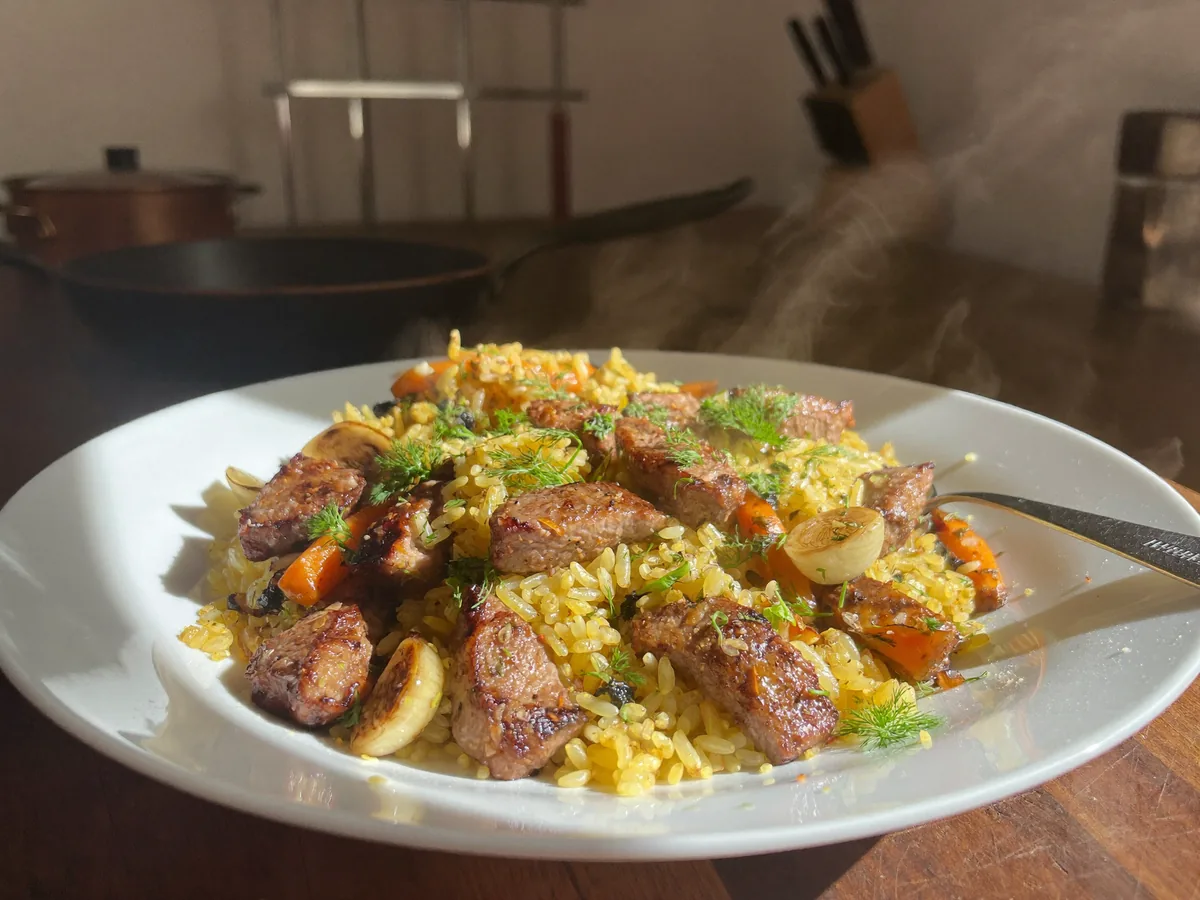 Плов с куриными сердечками в казане